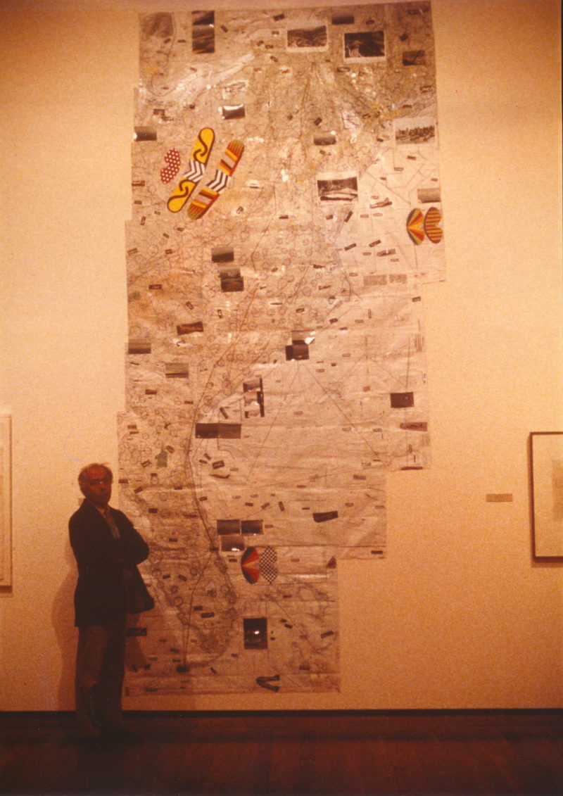 Poleskie standing in front of his 15 foot tall collage drawing, "East Coast Airplane Dance".